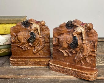 Ornawood, Syroco style pair of Bucking Bronco Cowboy bookends, vintage 1940-50’s, composite wood, faux wood book stops.