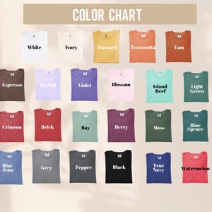 May include: A color chart featuring a variety of t-shirts in different colors. The colors include white, ivory, mustard, terracotta, yam, espresso, orchid, violet, blossom, island reef, light green, crimson, brick, bay, berry, moss, blue spruce, blue jean, grey, pepper, black, true navy, and watermelon.