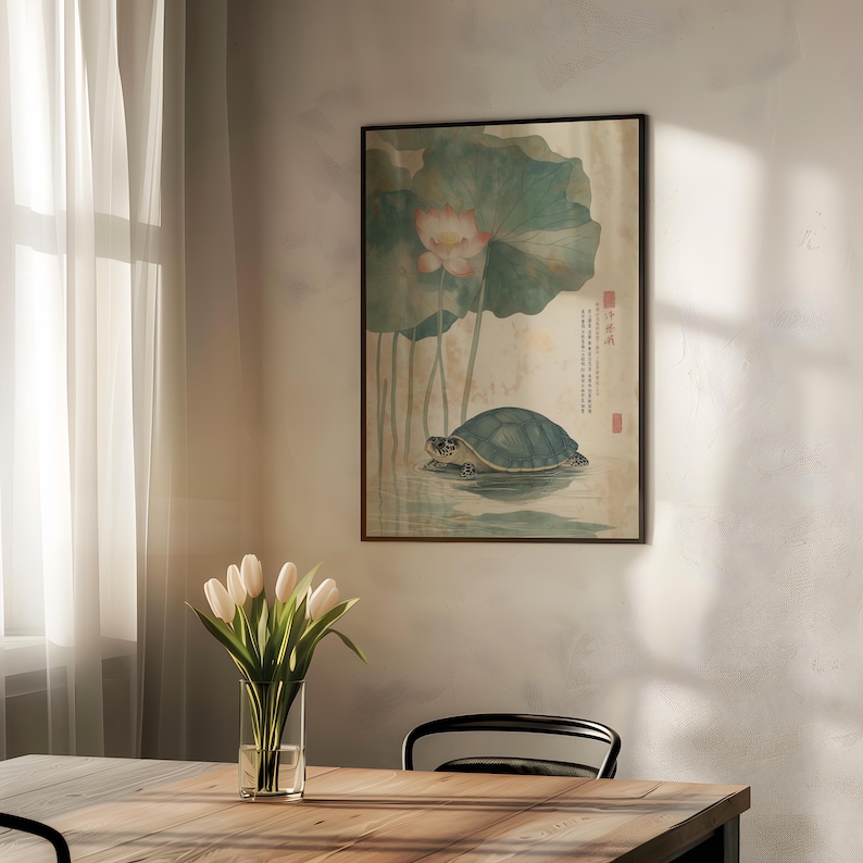 May include: Framed art print featuring a turtle in water beneath a lotus flower. The artwork has a vintage aesthetic with soft green, blue, and beige tones. The print includes Asian characters.