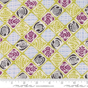May include: A green and white fabric with a repeating pattern of stylized floral and leaf designs. The pattern is set against a light blue background with a grid pattern. The fabric is from Moda Fabrics.