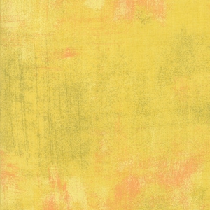 May include: A yellow textured background with subtle green and orange accents. The background has a slightly rough, uneven texture.