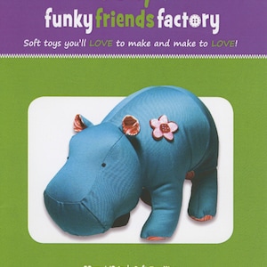 May include: A sewing pattern for a blue and pink hippopotamus soft toy. The pattern is called "Heather HIPPO" and is for a 13 inch soft toy.