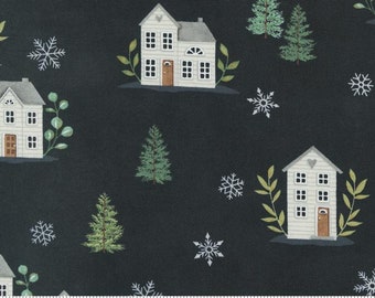 May include: A black fabric with a white house, green trees, and snowflakes pattern. The fabric has a white ruler with the word "moda" printed on it.