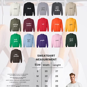 Puede incluir: Una sudadera de cuello redondo Gildan Heavy Blend 18000 en varios colores, incluyendo blanco, negro y rojo. La imagen muestra una tabla de tallas con medidas en cm, y detalles sobre la tela y las caracter&iacute;sticas.