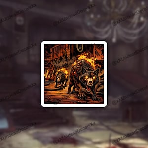 May include: A white ceramic mug with a black handle and the text "But First, Coffee" in a bold, black font. The mug is set against a blurred background, suggesting a cozy setting. The mug appears to be approximately 4 inches tall.