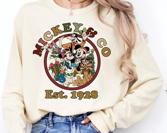 Mickey And Co Est. 1928 Christmas Sweatshirt, Mickey's Very Merry Xmas Matching Tee, Disney Vacation Gift,Magic Kingdom Xmas Sweatshirt