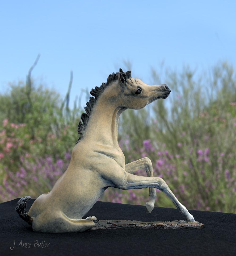 Rise and Shine bronze reclining foal created using "lost wax" process.