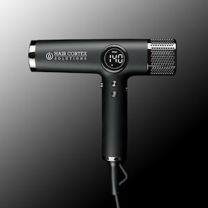 May include: Black hair dryer with a digital display showing "140" and the text "HAIR CORTEX SOLUTIONS" on the side. The dryer has a silver nozzle and a black cord.