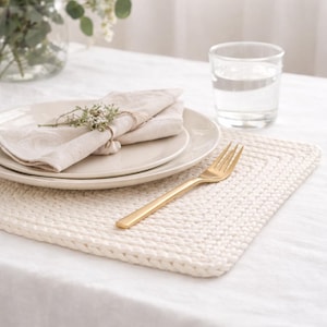 May include: A rustic wooden sign with the text "Welcome to our home" in white lettering. The sign has a distressed finish and a simple, inviting design, ideal for entryway decor.