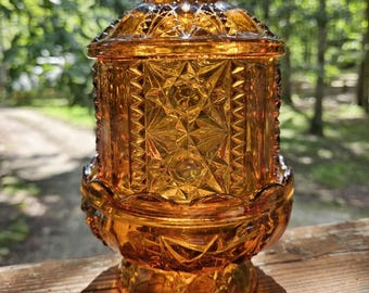 Vintage Indiana Pressed Glass Amber Fairy Lamp. Stands approx. 7&quot; Tall x 5&quot; Wide.