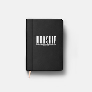 May include: Black notebook with the word "WORSHIP" printed on the front cover. The text "Serve the Lord with gladness: come before his presence with singing." and "PSALM 100:2" is also printed on the cover.