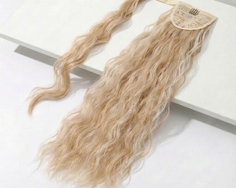 Highlighted Blonde Wavy Wrap Around Ponytail Extension | 20" Long Ponytail Beach Wave Texture | Heat-Resistant Dark Blonde Hairpiece