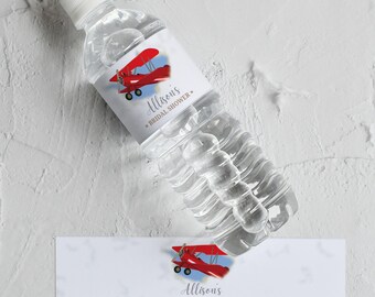 May include: Clear plastic water bottle with a white cap and a label featuring a red biplane design. The label reads "Allison's Bridal Shower" in elegant script. A matching label is also visible.