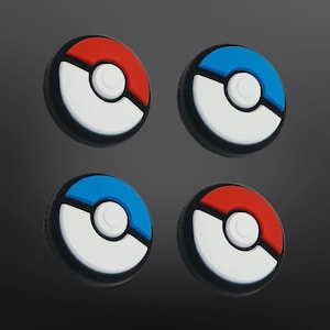May include: Four round, black, white, red, and blue Pokeball-shaped controller caps.