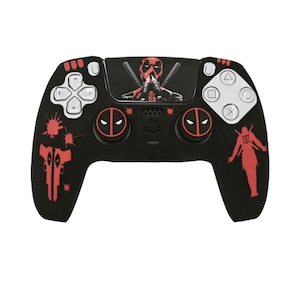 May include: Black PlayStation 5 controller with red and white detailing. The controller has a Deadpool graphic in the centre and red Deadpool logos on the handles. The buttons are white and the directional pad is silver.