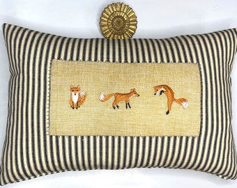 Woodland fox and stripe kidney pillow in