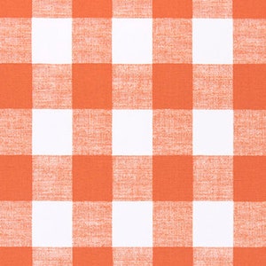 May include: A white and orange checkered fabric with a subtle texture.