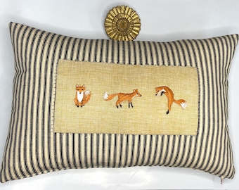 Woodland fox and stripe kidney pillow in ticking stripe