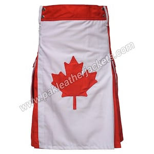 Puede incluir: Un kilt con el diseño de la bandera canadiense. El kilt tiene un panel central blanco con un gran emblema de hoja de arce roja. Los bordes superior y laterales son rojos. La dirección del sitio web "pakleatherjackets.com" es visible.