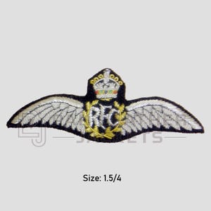 May include: Embroidered RFC badge with silver wings, a gold wreath, and a crown. The badge is black with silver and gold detailing. The text "RFC" is in gold. The size is 1.5/4 inches.