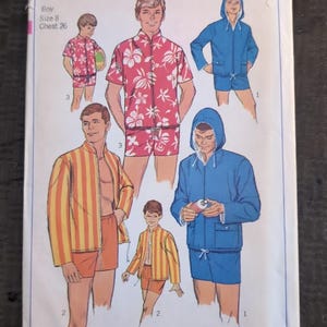 May include: A Simplicity sewing pattern envelope 7146 for a boy's size 8, chest 26, featuring illustrations of various outfits including a pink floral shirt and shorts set, a blue hooded jacket and shorts set, and a yellow and orange striped jacket set.
