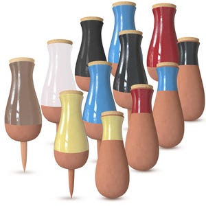 May include: A collection of decorative bottle stoppers in various colors, including brown, white, black, blue, red, and yellow. Each stopper has a cork top and a terracotta-colored base. Some stoppers have a pointed end.