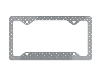 Szara ramka tablicy rejestracyjnej w kropki – smukła i elegancka, aluminiowa