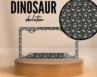 Elegancka i smukła ramka tablicy rejestracyjnej – szkielety dinozaurów – aluminium i metal