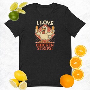 おもしろチキンストリップスシャツ - レトロな「I Love Chicken Strips」漫画Tシャツ