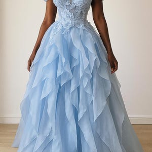 Light Blue Off-Shoulder Ball Gown with Floral Appliques – Princess Layered Prom Dress