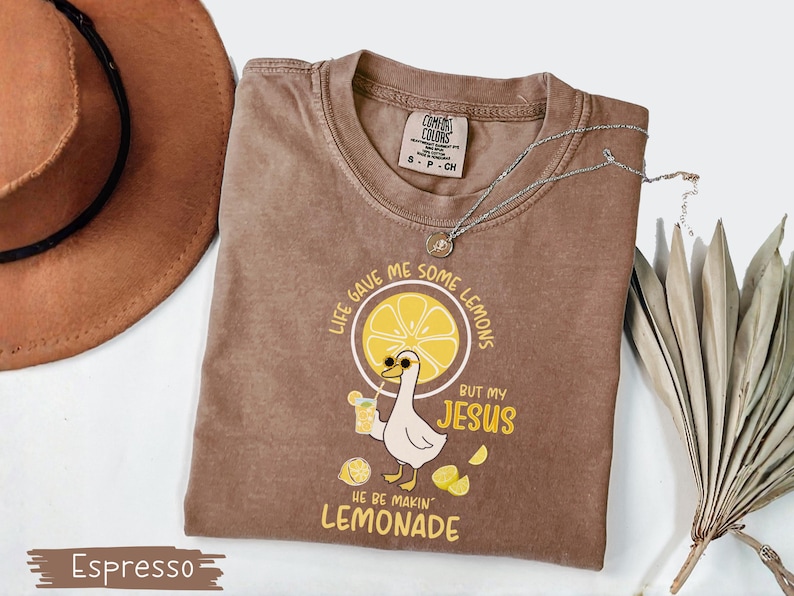 Comfort Colors® Life Gave Me Some Lemons But My Jesus He Be Makin' Lemonade Silly Goose Shirt, Christian Gift For Women, Faith Apparel Unisex Espresso