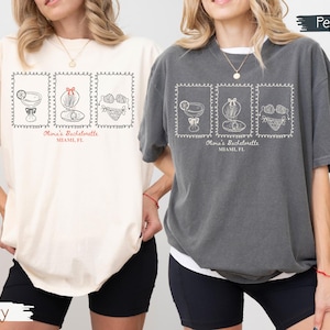 Custom bachelorette beach matching shirts with coastal doodle illustrations, including cocktails, shells, oysters, and bikinis. Personalized bride squad tees for beach trips, bridesmaids, and bach party vacations.