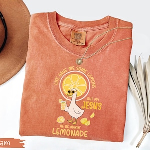 Comfort Colors® Life Gave Me Some Lemons But My Jesus He Be Makin' Lemonade Silly Goose Shirt, Christian Gift For Women, Faith Apparel Unisex Yam