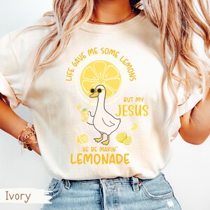 Comfort Colors® Life Gave Me Some Lemons But My Jesus He Be Makin' Lemonade Silly Goose Shirt, Christian Gift For Women, Faith Apparel Unisex Ivory