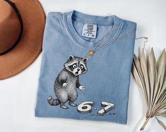 Six Seven Shirt, Funny 6 7 Meme Tee, Raccoon Knocking Off 67, Funny Raccoon Shirt, Funny Raccoon 6 7 Shirt Comfort Colors®