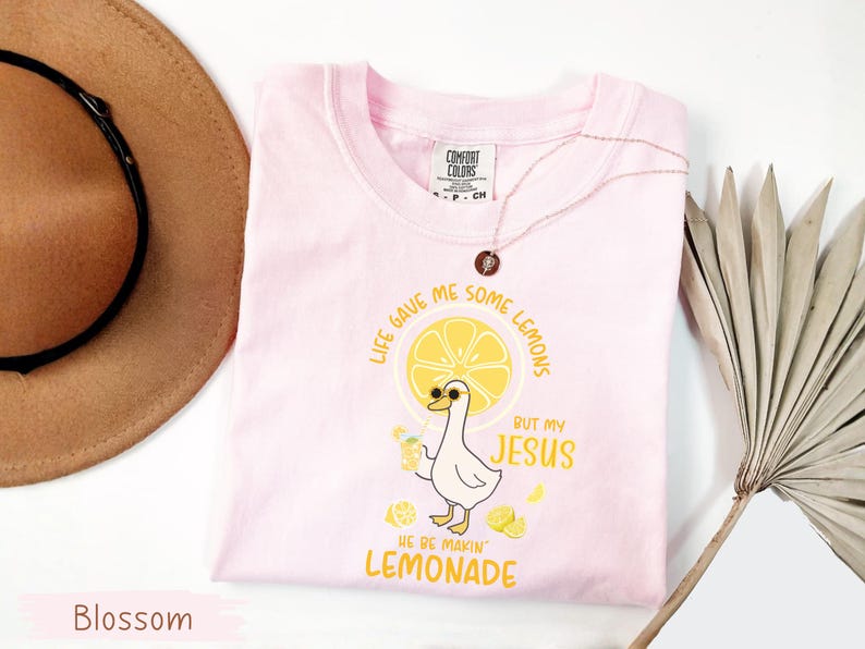 Comfort Colors® Life Gave Me Some Lemons But My Jesus He Be Makin' Lemonade Silly Goose Shirt, Christian Gift For Women, Faith Apparel Unisex Blossom