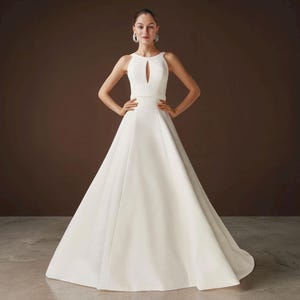 A-Line Mikado Wedding Dress, Keyhole Halter Neck Low Back Wedding Gown with Button Back, Simple Classic Ivory Bridal Gown with Chapel Train.