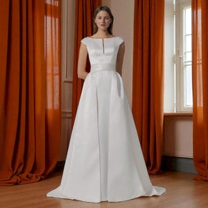 Simple Elegant A Line Wedding Dress with with Over Skirt, Modern Boat Neck Cap Sleeve Dress with Sweep Train, Open Back Wedding Dress.