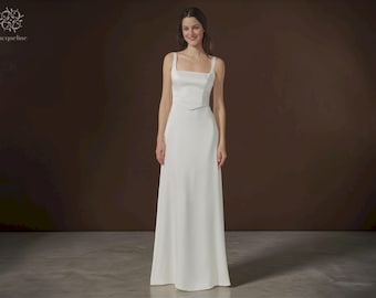 Vestido de novia minimalista color marfil: sencillo y elegante, con escote cuadrado y espalda descubierta.