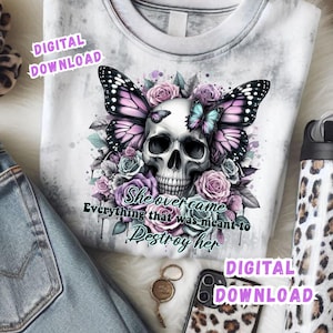 May include: White tie-dye sweatshirt featuring a skull with butterfly wings and floral accents in shades of purple, pink, and blue. The text "She overcame everything that was meant to destroy her" is below the skull. Digital download.