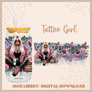 May include: A glass tumbler with a bamboo lid and a straw, featuring a colorful graphic of a woman with butterfly wings, tattoos, and sunglasses. The text "Tattoo Girl" and "I'M SORRY YOU DON'T LIKE ME, Not Everyone Has Good Taste" are also visible.