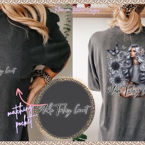 May include: Dark gray t-shirt with the text "Make Today Count" on the front and back. The back features a graphic of a woman with gray hair, butterflies, and flowers. The shirt has a matching pocket.