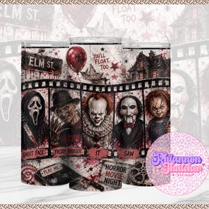 May include: A cylindrical tumbler featuring a horror movie theme with a film strip design. It displays characters including Ghost Face, Freddy Krueger, It, Saw, and Chucky, with text reading ELM ST., YOU'LL FLOAT TOO, PLAY ME, and HORROR MOVIE NIGHT.
