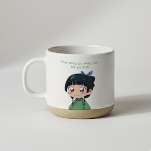 Könnte beinhalten: Weißer Keramikbecher mit gesprenkelter Oberfläche und beigefarbenem Boden. Der Becher zeigt eine Anime-Illustration eines Charakters in grüner Kleidung mit dem Text "This may or may not be poison".