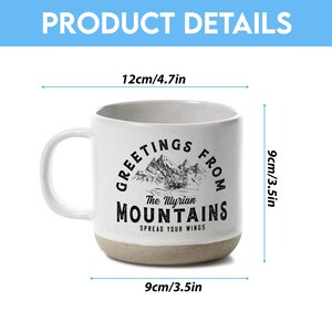 May include: White ceramic mug with a speckled finish, featuring the text "GREETINGS FROM The Illyrian MOUNTAINS" and a mountain illustration. The mug is 9 cm wide and tall, and 12 cm wide including the handle.