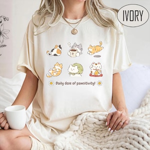 Shirt schattig kat - dagelijkse dosis pawsitivity-T-shirt, kawaii kitty grafisch T-shirt, pastel cartoon kattenshirt, cadeau voor kattenliefhebbers
