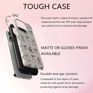 May include: A phone case with a white background and a pattern of black ghost illustrations and bows. The case is composed of two layers of materials and is described as durable and age resistant. The text "TOUGH CASE" is at the top.