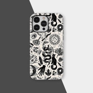 May include: A phone case with a black and white pattern featuring mystical symbols. The design includes a snake, cats, sun, moon, crystals, and other occult-themed illustrations. The case has a glossy finish and a camera cutout.