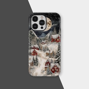 May include: A phone case featuring a winter village scene under a full moon. Red houses are nestled in a snowy landscape with evergreen trees and mountains in the background. The night sky is filled with stars.