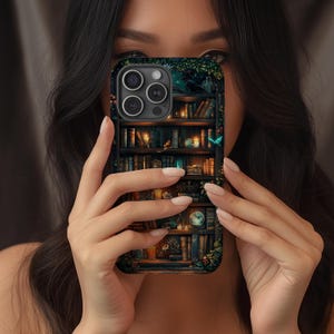 May include: A phone case featuring a detailed illustration of a bookshelf filled with books, candles, and decorative items. The design incorporates a dark color palette with hints of green and gold, creating a fantasy theme. The case has a glossy finish.